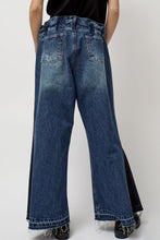 Load image into Gallery viewer, KSENIASCHNAIDER Baggy Jeans with Contrast Sidelines in Blue and Black